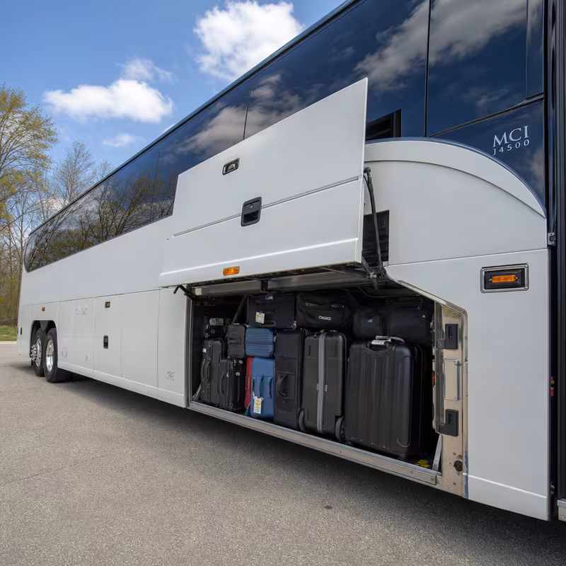 Party bus interior with wraparound leather seating and LED lighting in Orlando