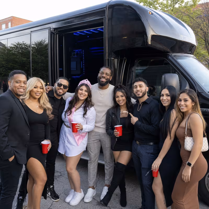 Party bus interior with wraparound leather seating and LED lighting in Orlando
