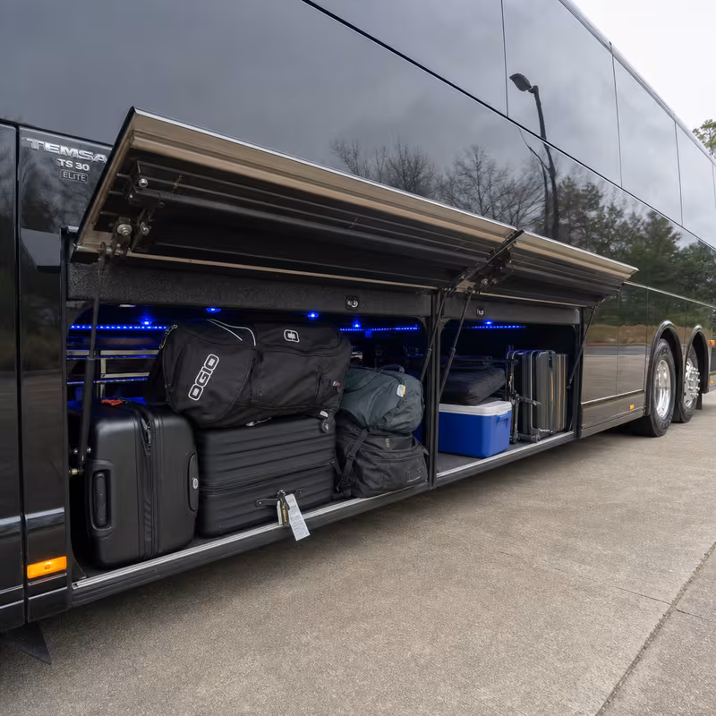 Party bus interior with wraparound leather seating and LED lighting in Orlando